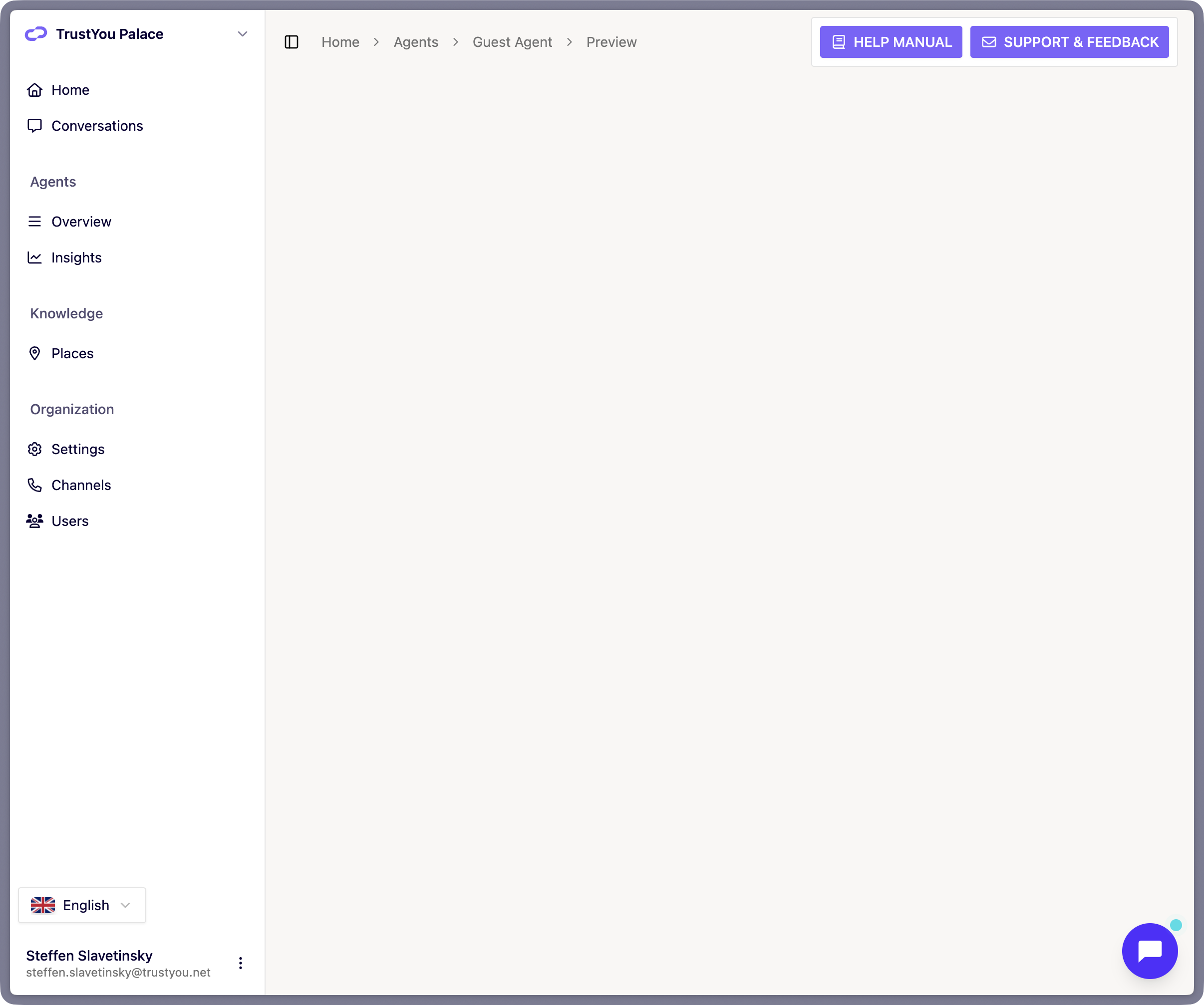 A website page showing the chat indicator (the launcher button) in the bottom corner, displaying the Organization's logo and using the configured primary and secondary brand colors.